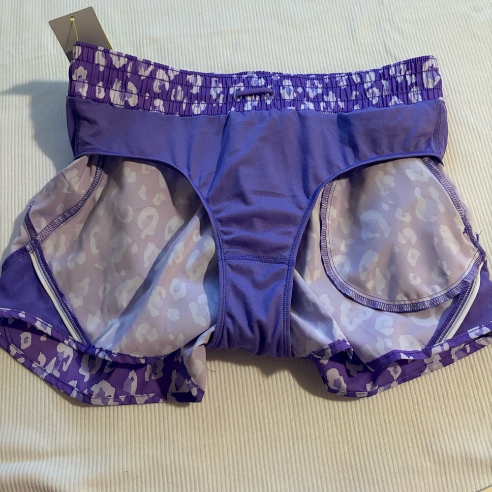 All in Motion Mid-Rise Run Shorts Purple Leopard Zip Pocket Lined - Picture 7 of 8